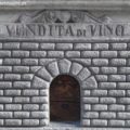 Das Weinloch in der Via del Giglio ist kunstvoll gemauert und trägt die Inschrift Vendita di Vino. Er verfügt über ein dunkelbraunes Holztürchen und sitzt direkt unter einem Fenstersims.